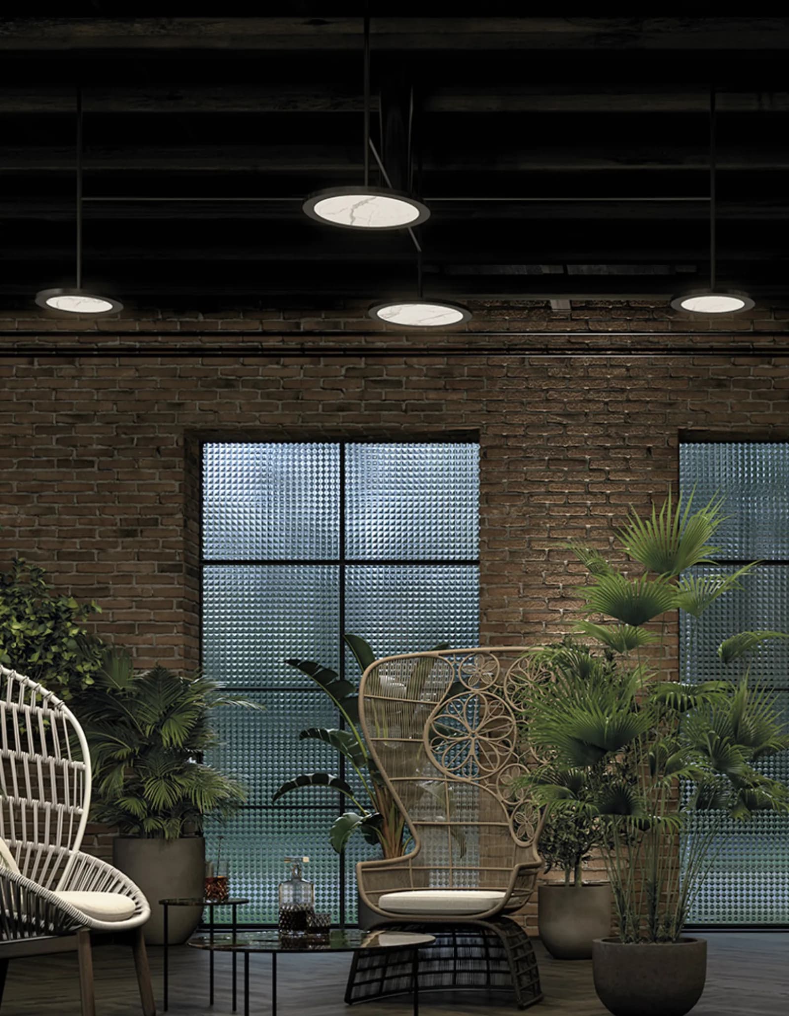 Gibas Moon chandelier illuminating a dark room